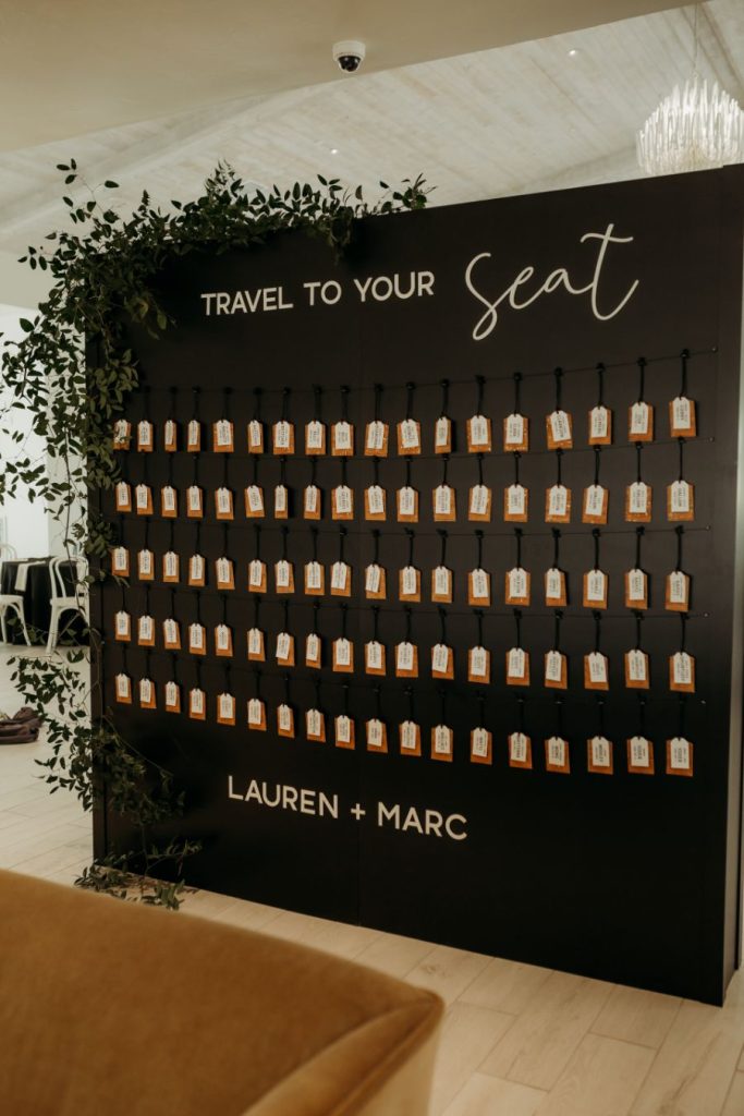 Travel to Your Seat Seating Chart on Marianne's Rentals Matte Black Escort Wall