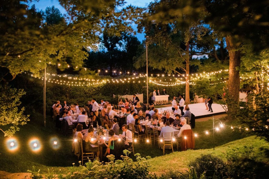 Backyard Wedding Inspo: an evening shot of Grace and Joe's reception space
