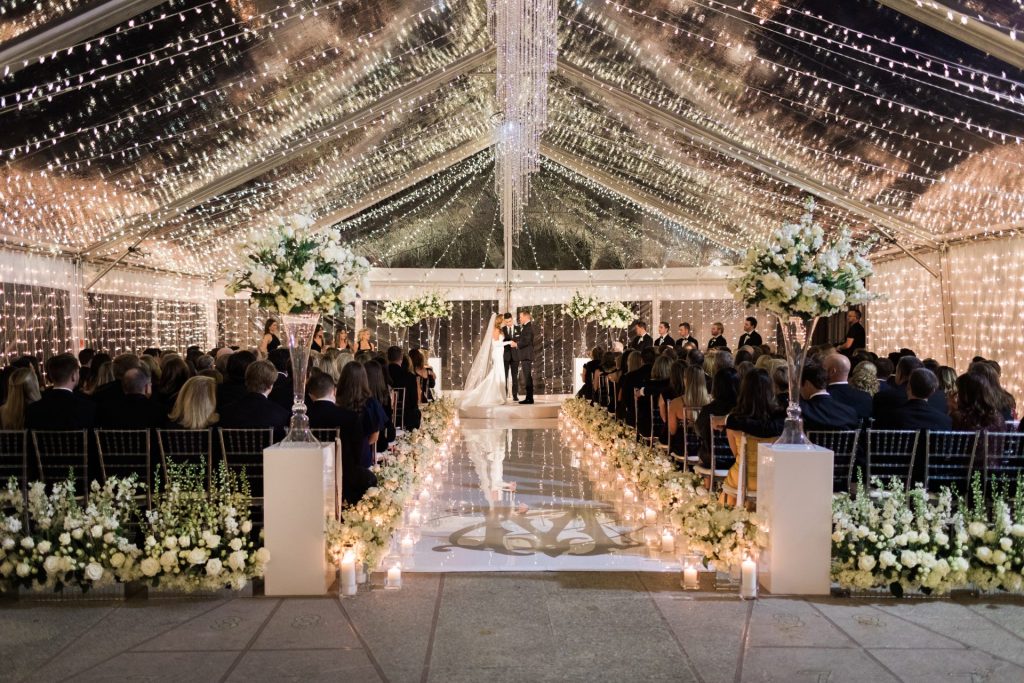 clear top tented wedding with string lights
